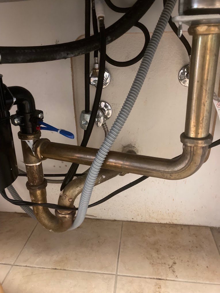 under sink metal drain p trap assembly LA Wrench Plumbing San Fernando Valley