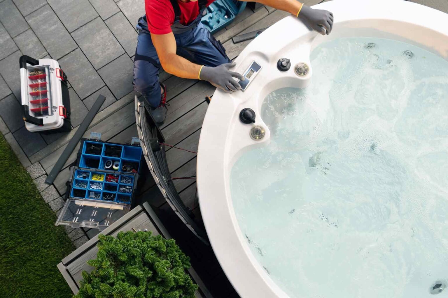 plumber servicing hot tub